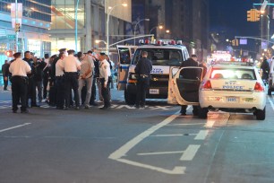 The scene near the Port Authority where two cops allegedly shot a pair of bystanders when another man pretended to have a gun.