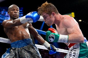 Floyd Mayweather (left) outclassed Saul "Canelo" Alvarez in the biggest boxing event of the year,