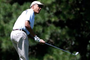 President Obama golfing in Martha's Vineyard.