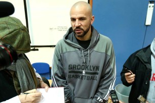 Nets coach Jason Kidd talks to the media in London.