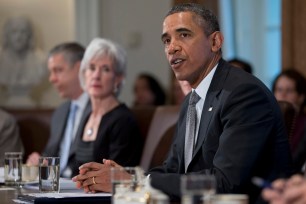 President Barack Obama speaks to the media before meeting his Cabinet meeting, Tuesday, Jan. 14, 2014,