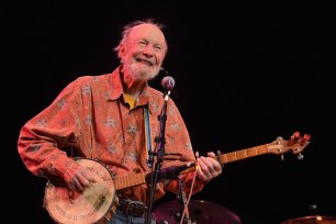 Singer Pete Seeger performs during the 'This Land Is Your Land'