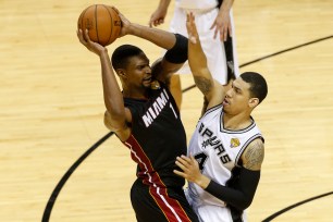 Miami Heat's Chris Bosh looks to pass the ball against the San Antonio Spurs during Game Two of the NBA Finals on June 8.