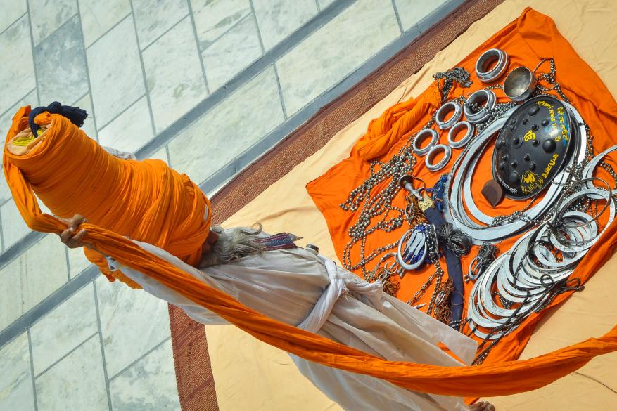 Avtar Singh prepares to wear a huge traditional Punjabi turban called "pagdi."