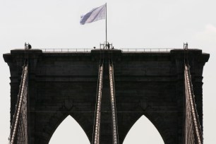 The white flag that flew atop the west tower of the Brooklyn Bridge July 22nd.