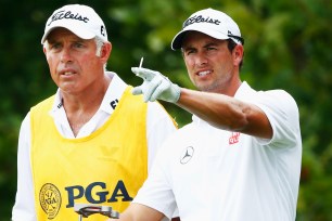 Adam Scott talks with caddie Steve Williams at the fourth tee during the PGA Championship earlier this month.