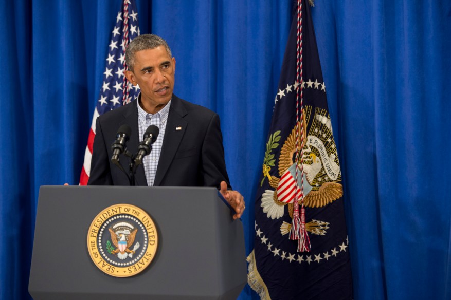 EDGARTOWN, MA - AUGUST 14: U.S. President Barack Obama delivers remarks during a press briefing at the Edgartown School on August 14, 2014 in Edgartown, Massachusetts. The president, vacationing on the island, spoke about the unrest in Ferguson, Missouri and Iraq. (Photo by Rick Friedman-Pool/Getty Images)