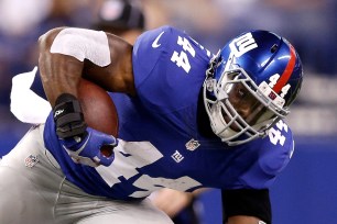 Andre Williams shakes a tackle during the Giants' win over Indianapolis last week.