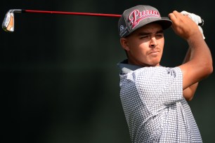 Rickie Fowler plays his shot from the first tee during the first round of The Barclays at The Ridgewood Country Club on August 21.