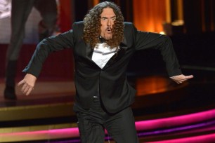 Weird Al Yankovic performs onstage performs onstage at the Emmy Awards.