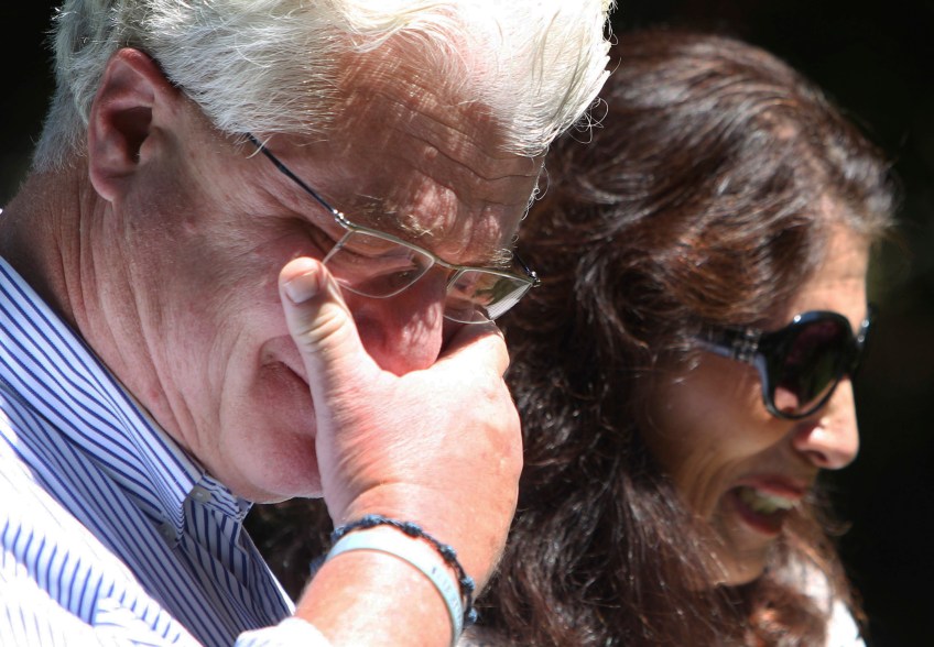 After speaking with U.S. President Barack Obama by phone, John and Diane Foley talk to reporters, Wednesday, Aug. 20, 2014, outside their home in Rochester, N.H. Their son James Foley was abducted in November 2012 while covering the Syrian conflict. Islamic militants posted a video showing his murder on Tuesday and said they killed him because the U.S. had launched airstrikes in northern Iraq. (AP Photo/Jim Cole)