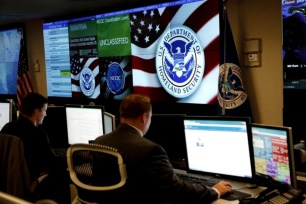 U.S. Department of Homeland Security employees working inside the National Cybersecurity and Communications Integration Center June 26th.