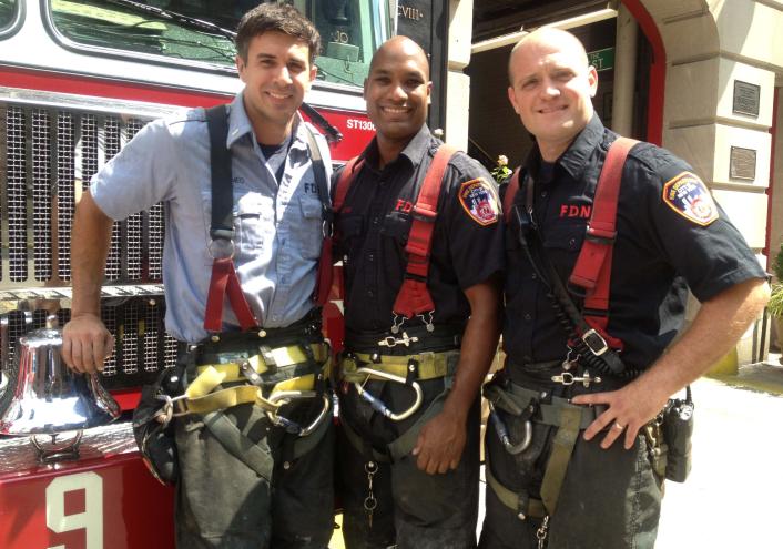 From left: Lt. Michael Demeo, Marlon Sahai and John Rocchio are seen after bravely rescuing two people from the apartment blaze.