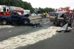 The scene of the collision where a car driving the wrong way on the New York State Thruway crashed head-on with another vehicle. Both drivers were killed.