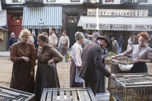 The trendy LES street (below) was transformed into a farmers market, circa 1900, for the filming of “The Knick.”