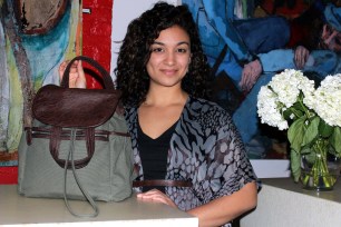 Diana Rubio with the popular backpack she designed.