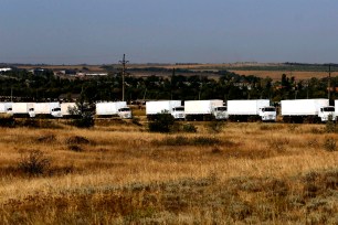 A Russian convoy of trucks carrying humanitarian aid for Ukraine drives towards the Ukrainian border August 22nd.