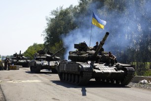Ukrainian troops patrol near the eastern Ukrainian city of Debaltseve in the Donetsk region on August 3.