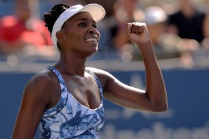 Venus Williams celebrates after finishing off Kimiko Date-Krumm of Japan on Monday.