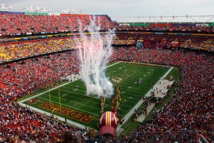 Fireworks burst at FedEx Field before a Washington Redskins game in 2011.