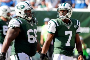 Geno Smith and Willie Colon during the Jets loss to the Lions.