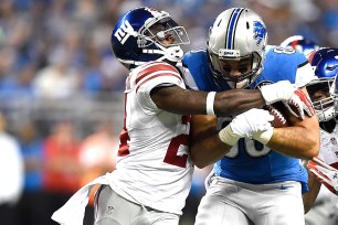 Walter Thurmond taking down Joseph Fauria in the Giants' Week 1 loss to the Lions.