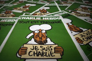 Copies of the latest edition of French Satirical magazine Charlie Hebdo