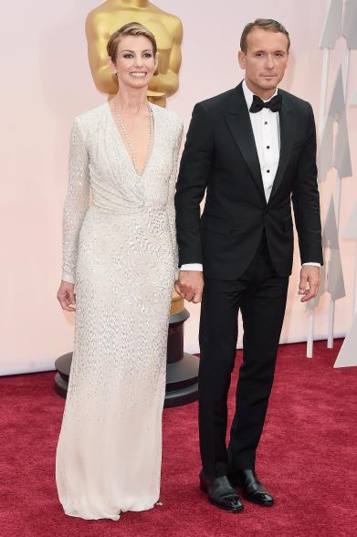 HOLLYWOOD, CA - FEBRUARY 22: Recording artists Faith Hill (L) and Tim McGraw attend the 87th Annual Academy Awards at Hollywood & Highland Center on February 22, 2015 in Hollywood, California. (Photo by Jason Merritt/Getty Images)