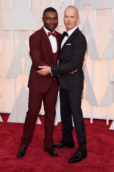 HOLLYWOOD, CA - FEBRUARY 22: Actors David Oyelowo (L) and Michael Keaton attend the 87th Annual Academy Awards at Hollywood & Highland Center on February 22, 2015 in Hollywood, California. (Photo by Jason Merritt/Getty Images)