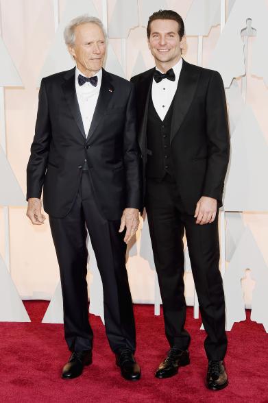 HOLLYWOOD, CA - FEBRUARY 22: Director Clint Eastwood (L) and actor Bradley Cooper attend the 87th Annual Academy Awards at Hollywood & Highland Center on February 22, 2015 in Hollywood, California. (Photo by Jason Merritt/Getty Images)