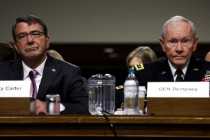 U.S. Secretary of Defense Ash Carter, left, and Chairman of the Joint Chiefs of Staff General Martin Dempsey testify during a Senate Armed Services Committee hearing on “Counter-ISIL Strategy.”