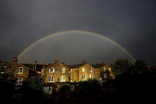 A double rainbow forms over London.