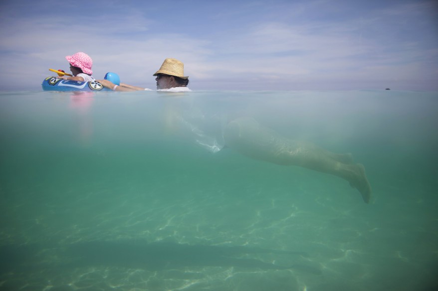 Locals go swimming in Varadero, Cuba.