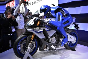 Japan's motorcycle maker Yamaha Motor introduces the prototype model of a motorcycle riding robot "Motobot" during a press preview in Tokyo on Oct. 28