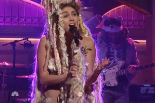 Miley Cyrus breaks down during SNL premiere