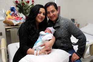 Carmen Peralta and Luis Duque with their baby boy Nathan