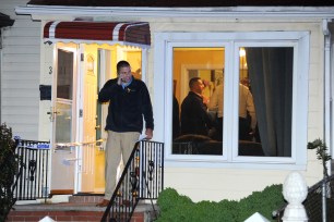 Police at the scene of the stabbing in Queens.