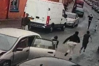 Nine men jump out of a tiny car and flee the crime scene