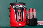 A Bodyarmor SuperDrink cooler and cups