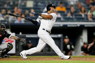 Aaron Hicks belts a game-tying two-run homer in the eighth inning of the Yankees' 5-4 comeback win Tuesday night.