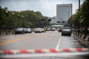 Police barricade a street near Jacksonville Landing in Jacksonville, Fla.