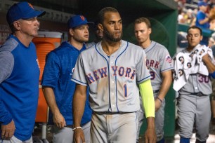 Amed Rosario and his teammates wear dejected expressions during the ninth inning of the Mets' 25-4 loss Tuesday night.