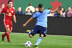 David Villa, kicking the ball up the field in the first half, scored the game-tying goal for NYCFC in their draw Wednesday night against the Red Bulls.