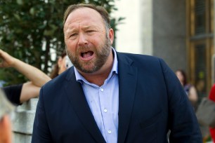 Alex Jones speaks outside of the Dirksen Senate building of Capitol Hill.