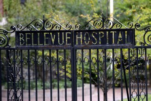 A sign on the gate for the entrance to Bellevue Hospital.