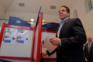Democratic New York Governor Andrew Cuomo pauses after casting his vote for the mid-term elections, at the Presbyterian Church in Mt. Kisco, New York.