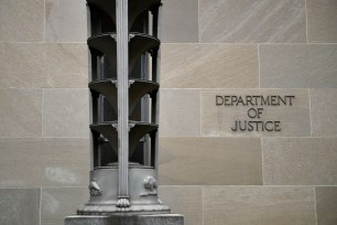 Sign on US Justice Department building