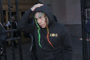 Tekashi 6ix9ine leaves Brooklyn Criminal Court.