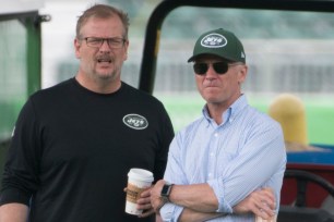 New York Jets GM Mike Maccagnan and co-owner Chris Johnson