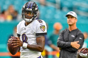 Lamar Jackson and John Harbaugh